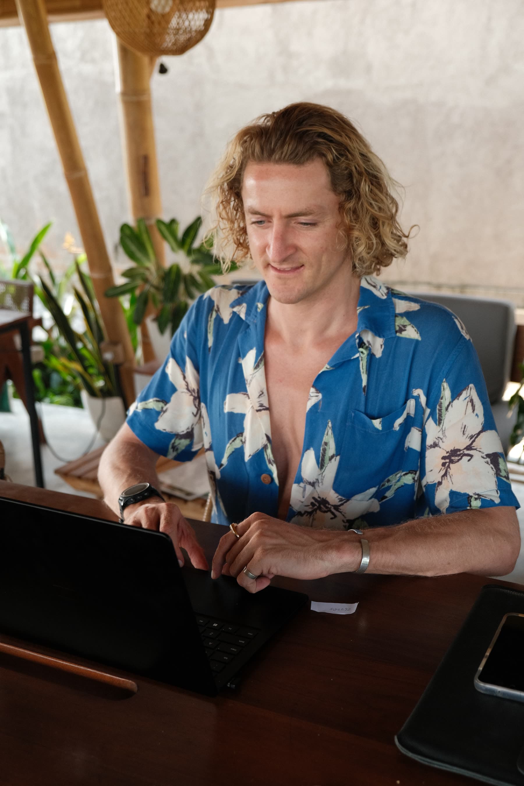 Jonty at his desk, where he takes the calls from
